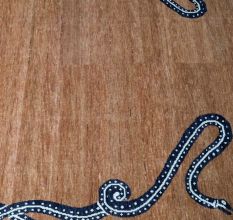 Serpentine Border Wool Rug